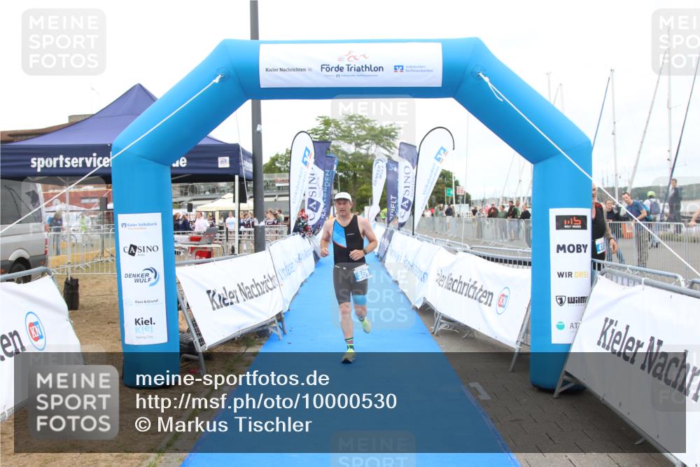 16.08.2026 - KN Förde Triathlon 2026 Markus Tischler http://msf.ph/oto/10000530 16.08.2026 12:21:29 Ziel 369, 369 meine-sportfotos.de