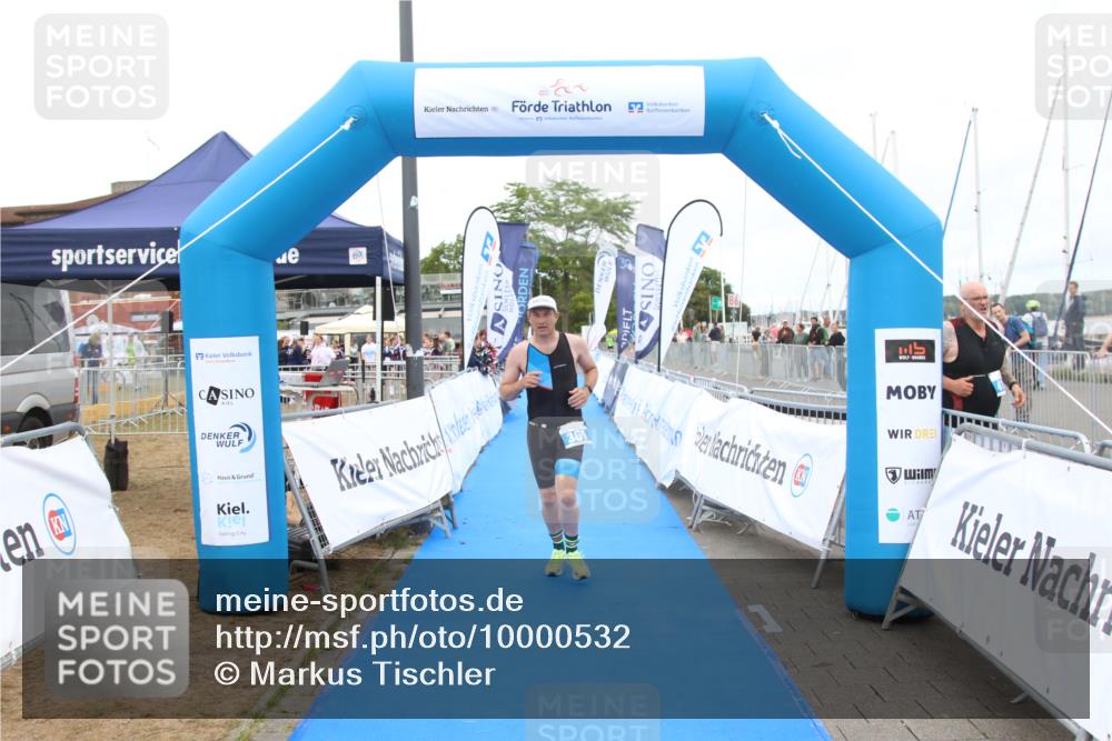 16.08.2026 - KN Förde Triathlon 2026 Markus Tischler http://msf.ph/oto/10000532 16.08.2026 12:21:29 Ziel 369, 369 meine-sportfotos.de