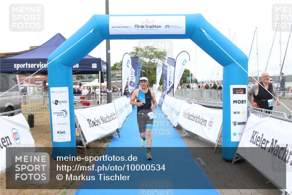16.08.2026 - KN Förde Triathlon 2026 Markus Tischler http://msf.ph/oto/10000534 16.08.2026 12:21:29 Ziel 369, 369 meine-sportfotos.de