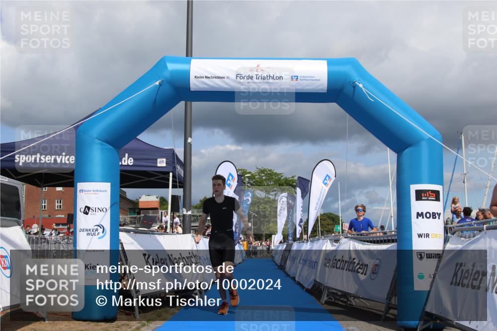 16.08.2026 - KN Förde Triathlon 2026 Markus Tischler http://msf.ph/oto/10002024 16.08.2026 13:48:53 Ziel 557, 557 meine-sportfotos.de