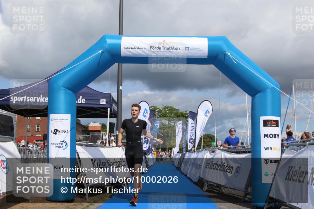 16.08.2026 - KN Förde Triathlon 2026 Markus Tischler http://msf.ph/oto/10002026 16.08.2026 13:48:53 Ziel 557, 557 meine-sportfotos.de