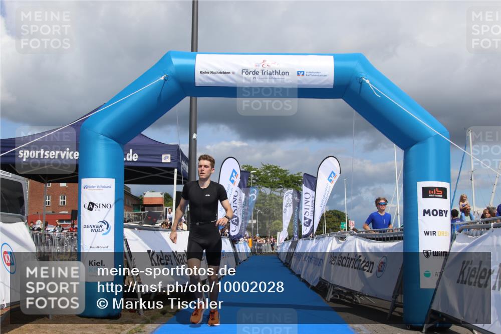 16.08.2026 - KN Förde Triathlon 2026 Markus Tischler http://msf.ph/oto/10002028 16.08.2026 13:48:53 Ziel 557, 557 meine-sportfotos.de