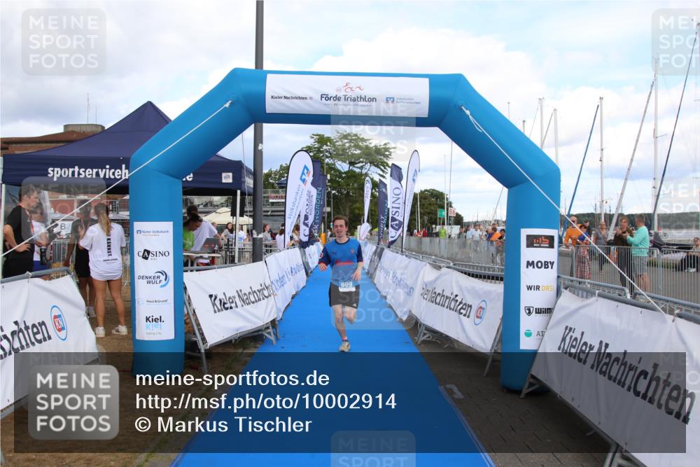 16.08.2026 - KN Förde Triathlon 2026 Markus Tischler http://msf.ph/oto/10002914 16.08.2026 14:21:53 Ziel 609, 609 meine-sportfotos.de