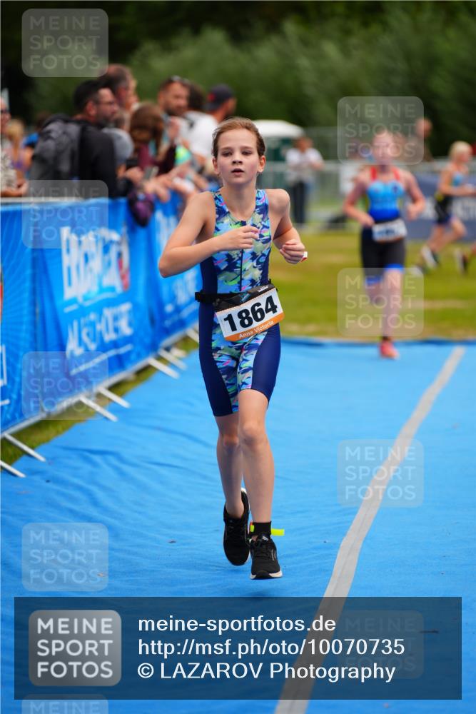 30.08.2026 - Elbe Triathlon Hamburg LAZAROV Photography http://msf.ph/oto/10070735 30.08.2026 12:54:25 Ziel 1836, 1857, 1864 meine-sportfotos.de