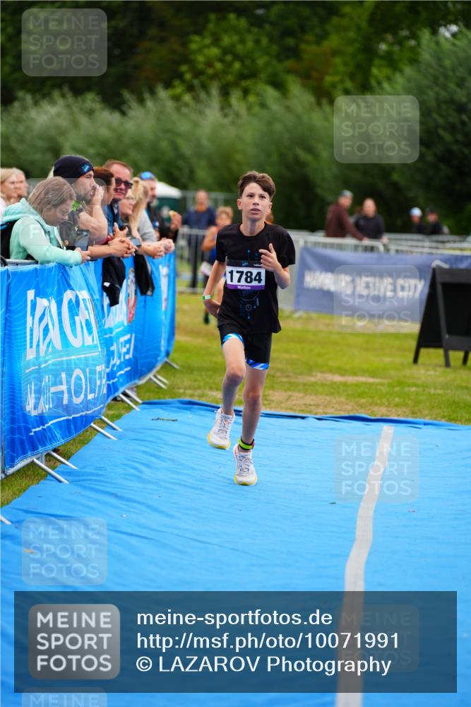 30.08.2026 - Elbe Triathlon Hamburg LAZAROV Photography http://msf.ph/oto/10071991 30.08.2026 13:09:19 Ziel 1777, 1784, 1828 meine-sportfotos.de