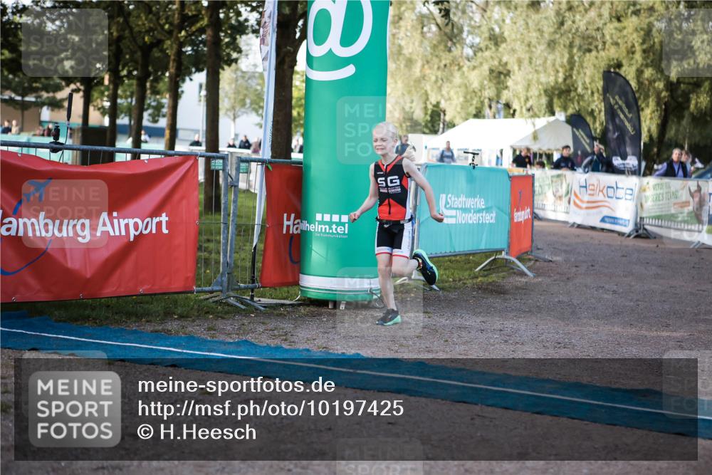 06.09.2026 - 20. Norderstedt Triathlon H.Heesch http://msf.ph/oto/10197425 06.09.2026 09:10:56 Ziel 31, 32, 34, 35, 48 meine-sportfotos.de