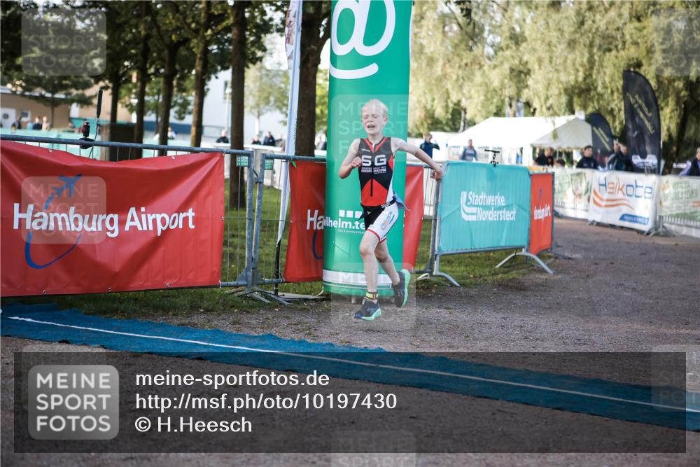 06.09.2026 - 20. Norderstedt Triathlon H.Heesch http://msf.ph/oto/10197430 06.09.2026 09:10:57 Ziel 31, 32, 34, 35, 48 meine-sportfotos.de