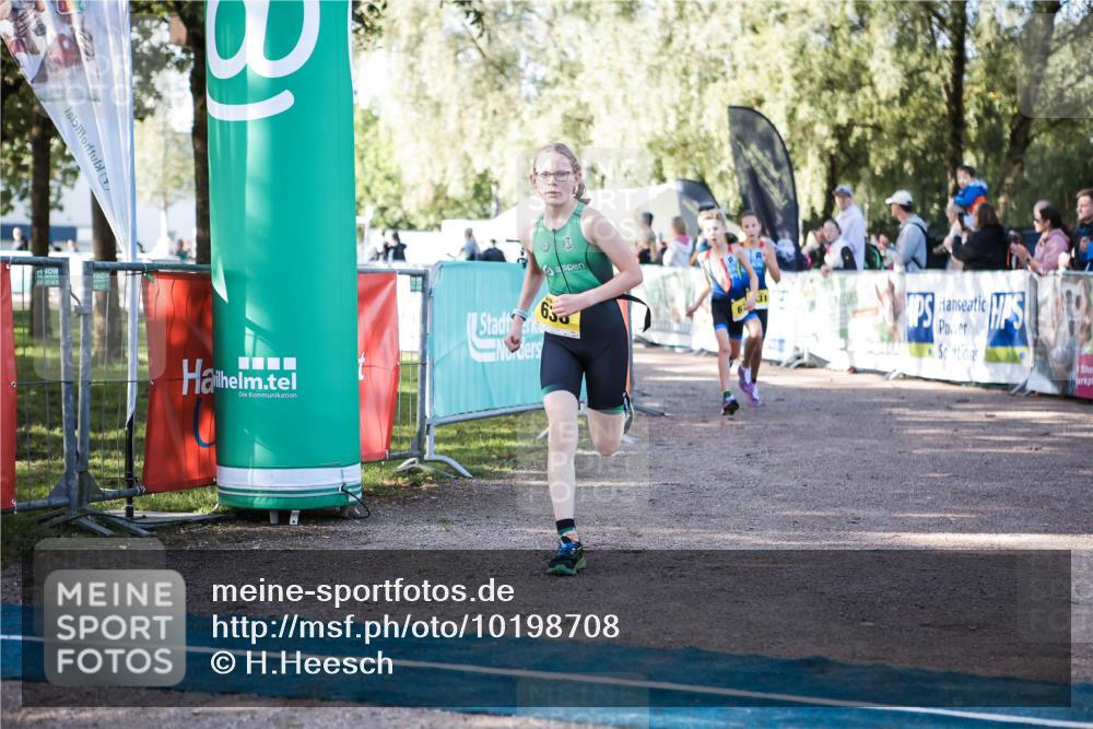 06.09.2026 - 20. Norderstedt Triathlon H.Heesch http://msf.ph/oto/10198708 06.09.2026 09:46:33 Ziel 631, 638, 677 meine-sportfotos.de