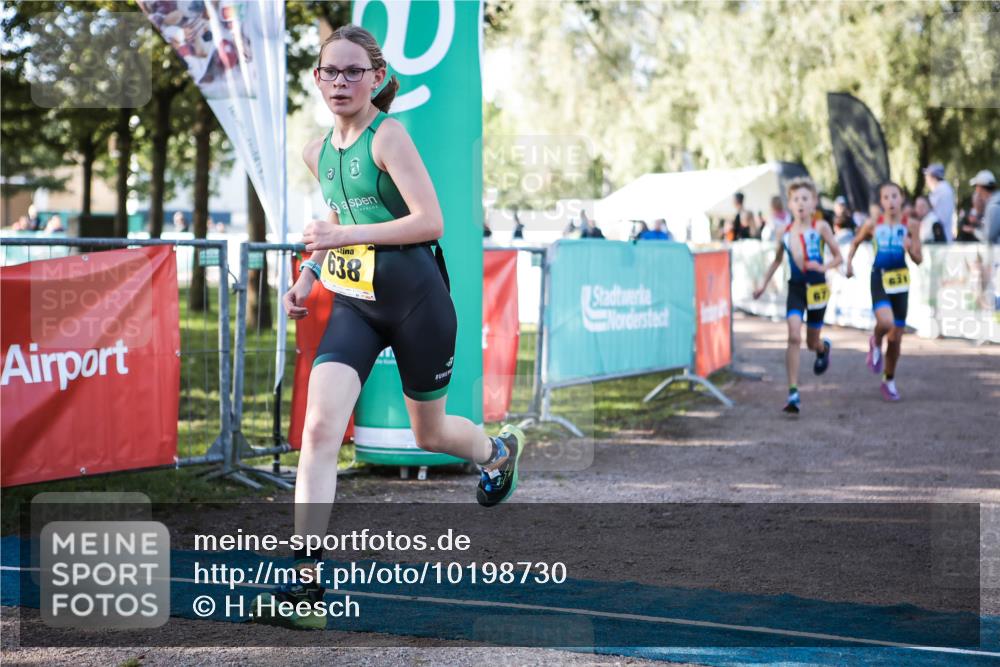 06.09.2026 - 20. Norderstedt Triathlon H.Heesch http://msf.ph/oto/10198730 06.09.2026 09:46:34 Ziel 631, 638, 677 meine-sportfotos.de