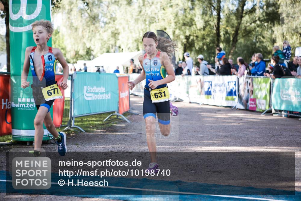 06.09.2026 - 20. Norderstedt Triathlon H.Heesch http://msf.ph/oto/10198740 06.09.2026 09:46:35 Ziel 631, 637, 638, 649, 677 meine-sportfotos.de