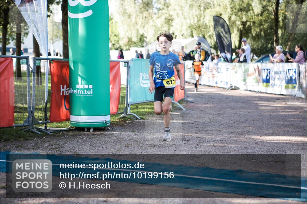 06.09.2026 - 20. Norderstedt Triathlon H.Heesch http://msf.ph/oto/10199156 06.09.2026 09:47:42 Ziel 629, 671, 675 meine-sportfotos.de