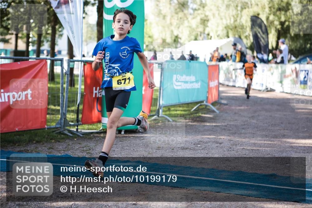 06.09.2026 - 20. Norderstedt Triathlon H.Heesch http://msf.ph/oto/10199179 06.09.2026 09:47:42 Ziel 629, 671, 675 meine-sportfotos.de