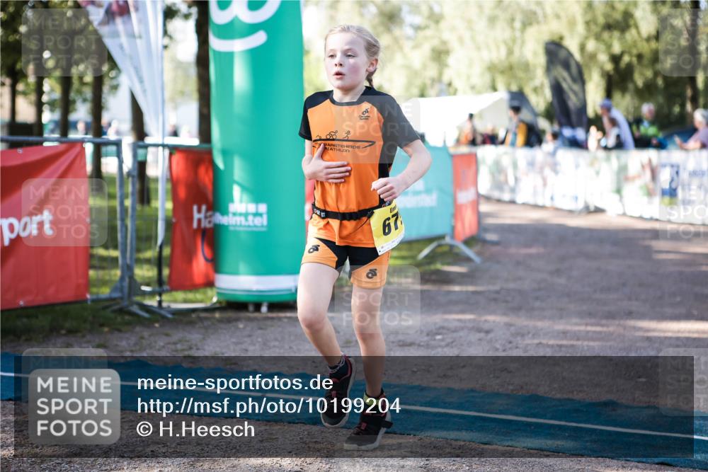 06.09.2026 - 20. Norderstedt Triathlon H.Heesch http://msf.ph/oto/10199204 06.09.2026 09:47:45 Ziel 671, 675 meine-sportfotos.de