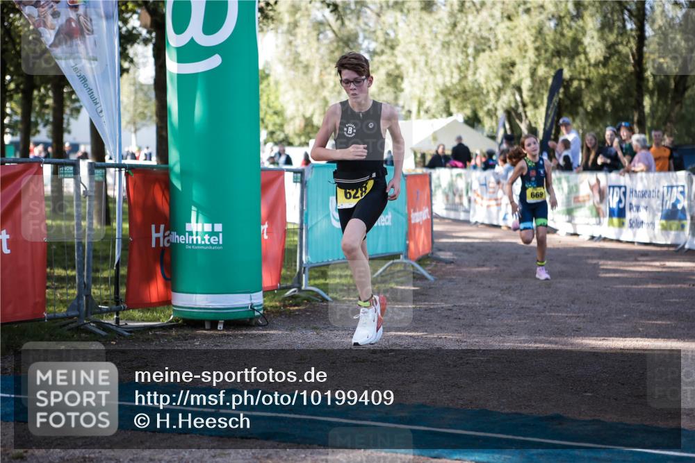 06.09.2026 - 20. Norderstedt Triathlon H.Heesch http://msf.ph/oto/10199409 06.09.2026 09:48:40 Ziel 628, 668, 669 meine-sportfotos.de