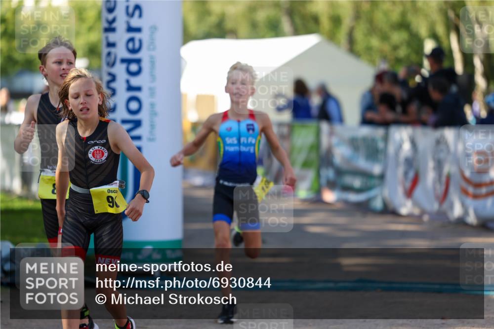 01.09.2024 - 17. Tribühne Triathlon Michael Strokosch http://msf.ph/oto/6930844 01.09.2024 09:47:42 Ziel 67, 71, 89, 90, 106, 119 meine-sportfotos.de