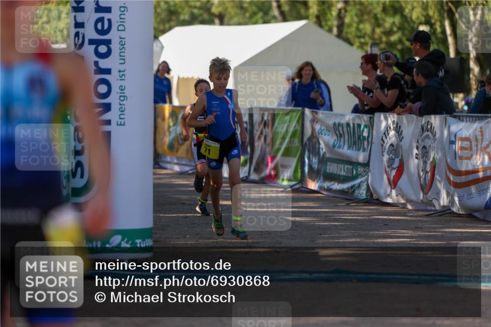 01.09.2024 - 17. Tribühne Triathlon Michael Strokosch http://msf.ph/oto/6930868 01.09.2024 09:47:47 Ziel 66, 71, 106, 119, 131 meine-sportfotos.de