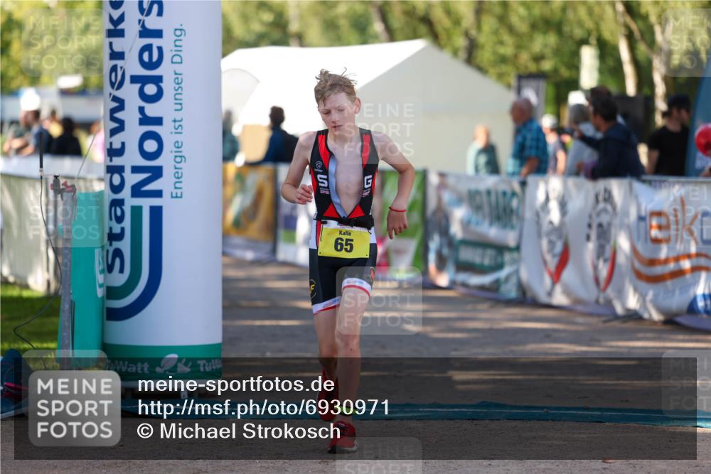 01.09.2024 - 17. Tribühne Triathlon Michael Strokosch http://msf.ph/oto/6930971 01.09.2024 09:49:25 Ziel 65, 68 meine-sportfotos.de