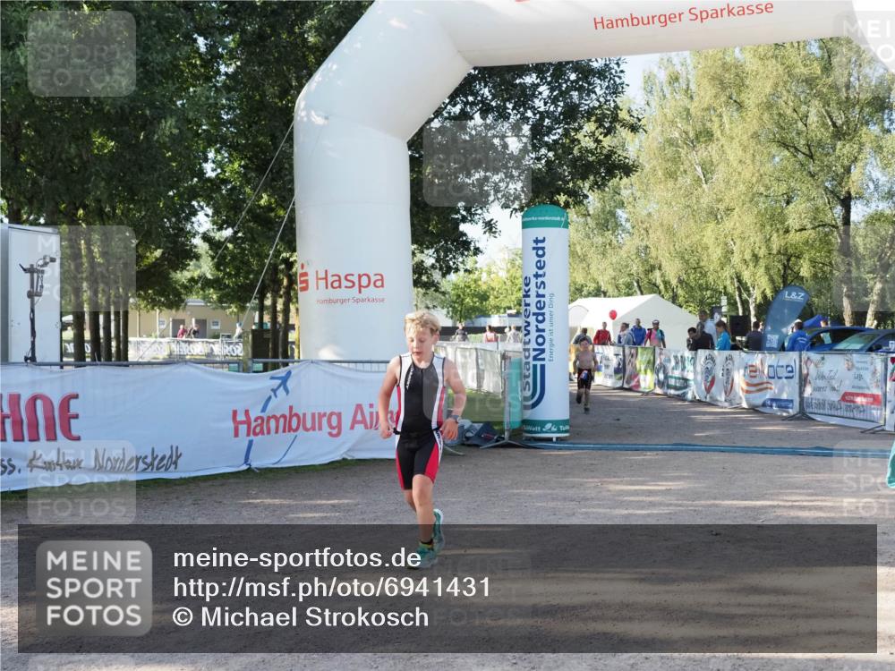 01.09.2024 - 17. Tribühne Triathlon Michael Strokosch http://msf.ph/oto/6941431 01.09.2024 09:13:55 Ziel 14, 27 meine-sportfotos.de