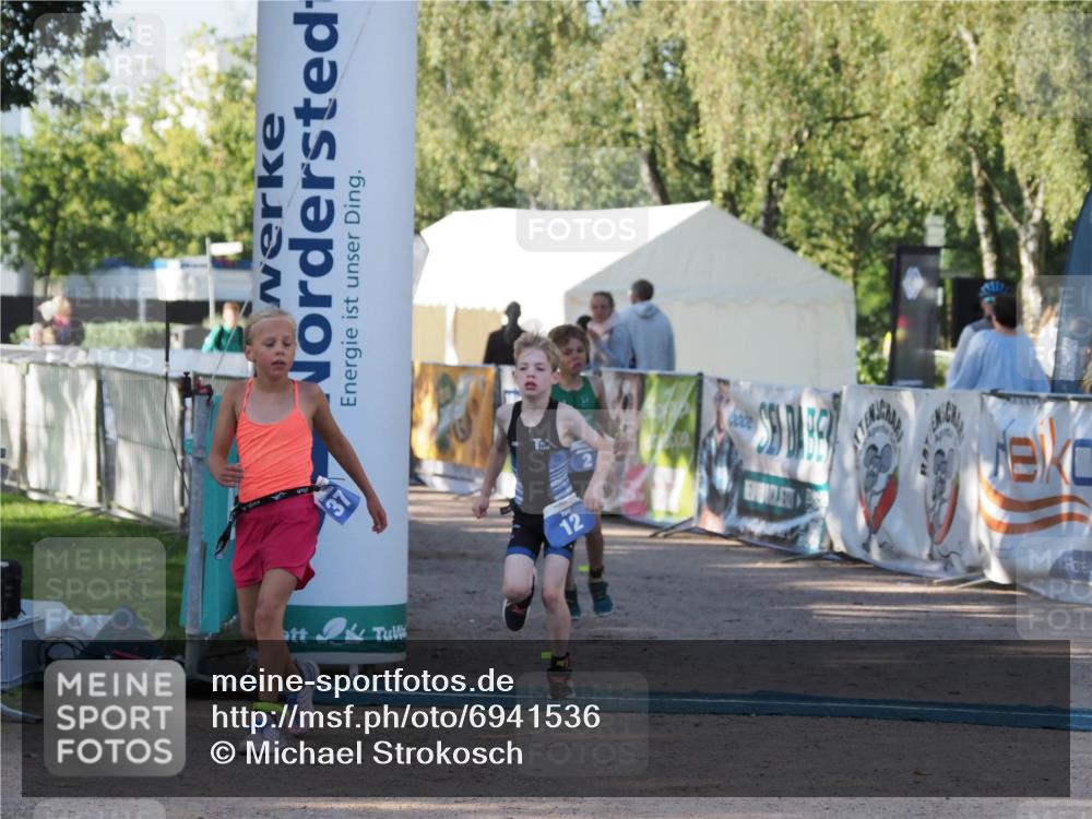 01.09.2024 - 17. Tribühne Triathlon Michael Strokosch http://msf.ph/oto/6941536 01.09.2024 09:15:12 Ziel 2, 12, 37 meine-sportfotos.de