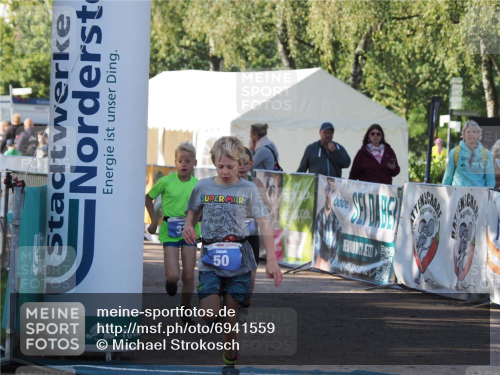 01.09.2024 - 17. Tribühne Triathlon Michael Strokosch http://msf.ph/oto/6941559 01.09.2024 09:15:43 Ziel 18, 32, 50 meine-sportfotos.de