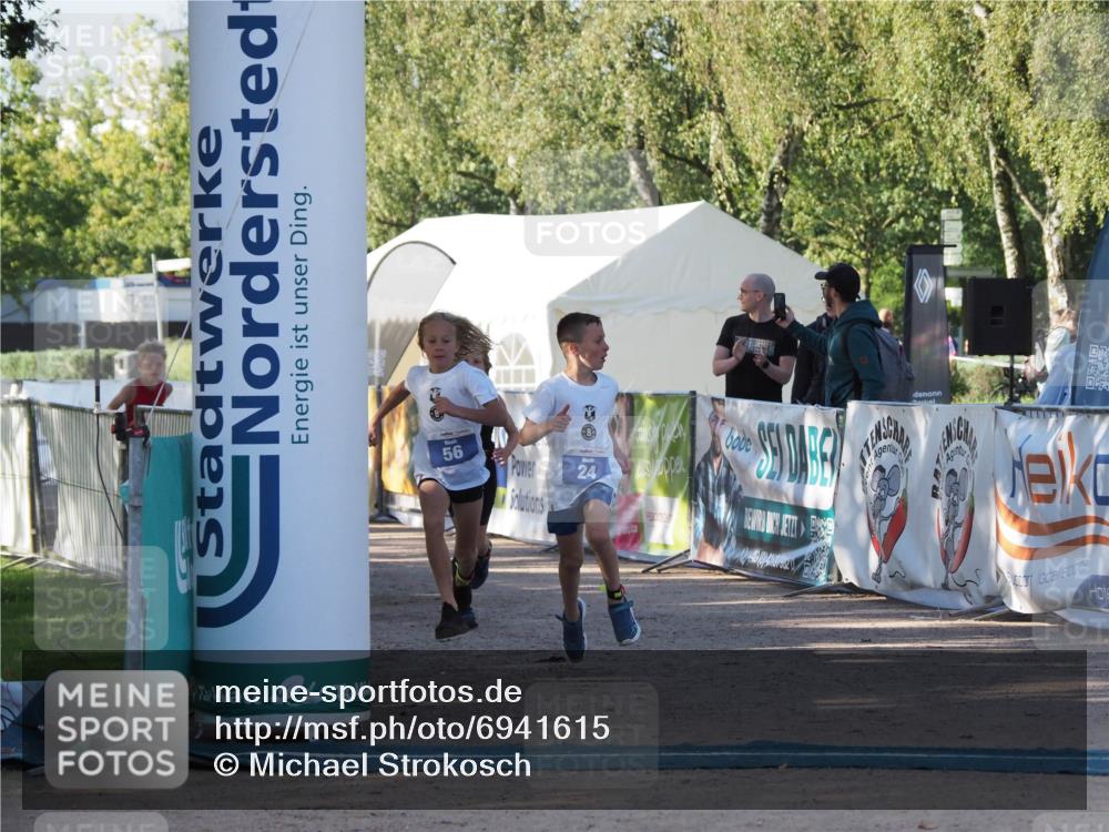 01.09.2024 - 17. Tribühne Triathlon Michael Strokosch http://msf.ph/oto/6941615 01.09.2024 09:16:31 Ziel 22, 24, 47, 56 meine-sportfotos.de