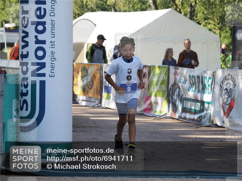 01.09.2024 - 17. Tribühne Triathlon Michael Strokosch http://msf.ph/oto/6941711 01.09.2024 09:18:24 Ziel 9 meine-sportfotos.de