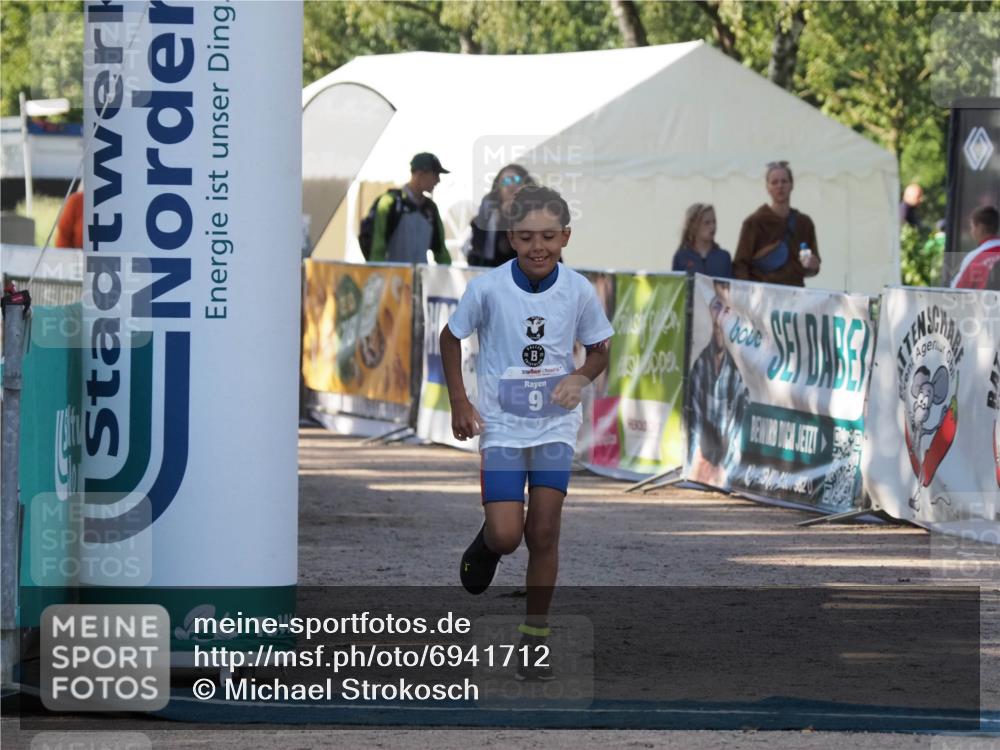 01.09.2024 - 17. Tribühne Triathlon Michael Strokosch http://msf.ph/oto/6941712 01.09.2024 09:18:24 Ziel 9 meine-sportfotos.de