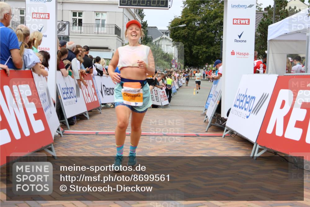 31.08.2025 - 21. Blankeneser Heldenlauf Strokosch-Dieckow http://msf.ph/oto/8699561 31.08.2025 12:43:09 Ziel 5686, 5607, 4096, 4110 meine-sportfotos.de
