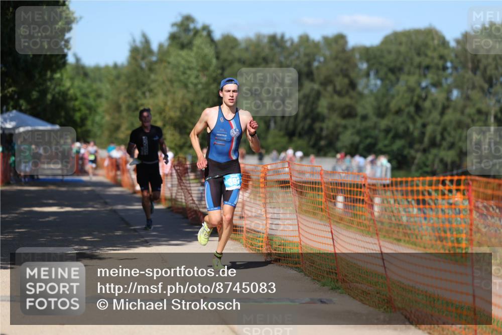 07.09.2025 - 19. Norderstedt Triathlon Michael Strokosch http://msf.ph/oto/8745083 07.09.2025 14:46:11 Laufen 392, 989, 991 meine-sportfotos.de