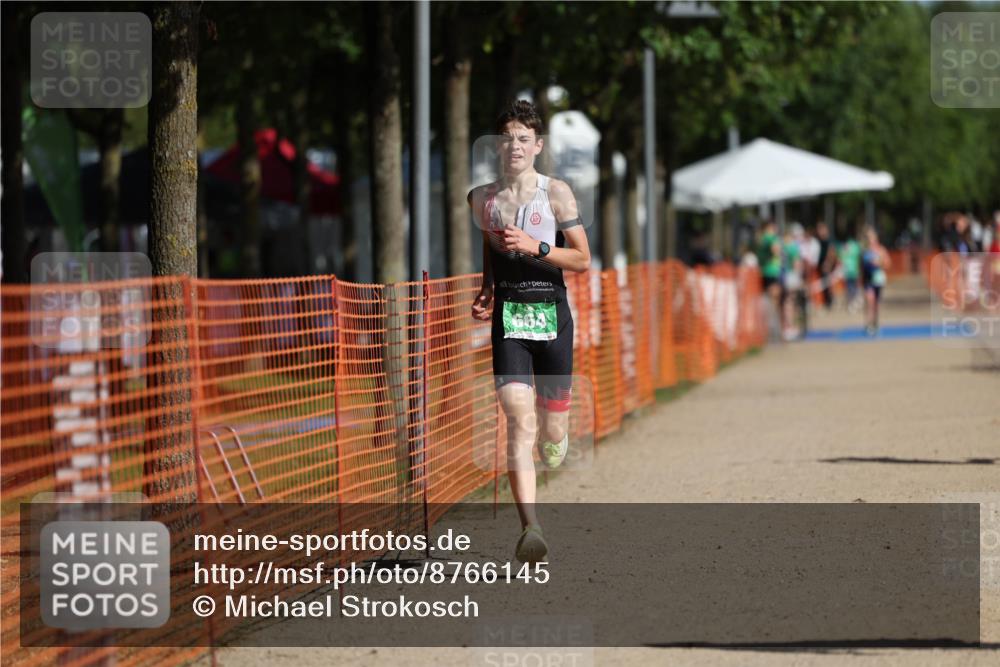07.09.2025 - 19. Norderstedt Triathlon Michael Strokosch http://msf.ph/oto/8766145 07.09.2025 10:49:51 Laufen 92, 664, 1118 meine-sportfotos.de