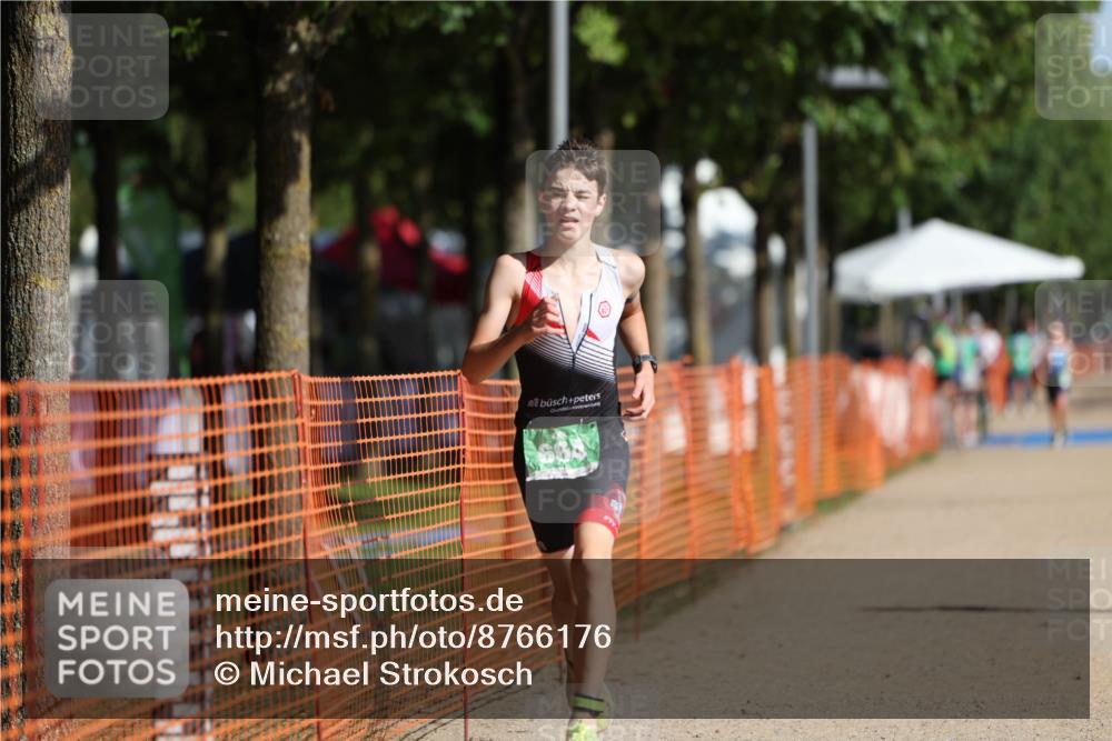 07.09.2025 - 19. Norderstedt Triathlon Michael Strokosch http://msf.ph/oto/8766176 07.09.2025 10:49:52 Laufen 92, 664, 1118 meine-sportfotos.de