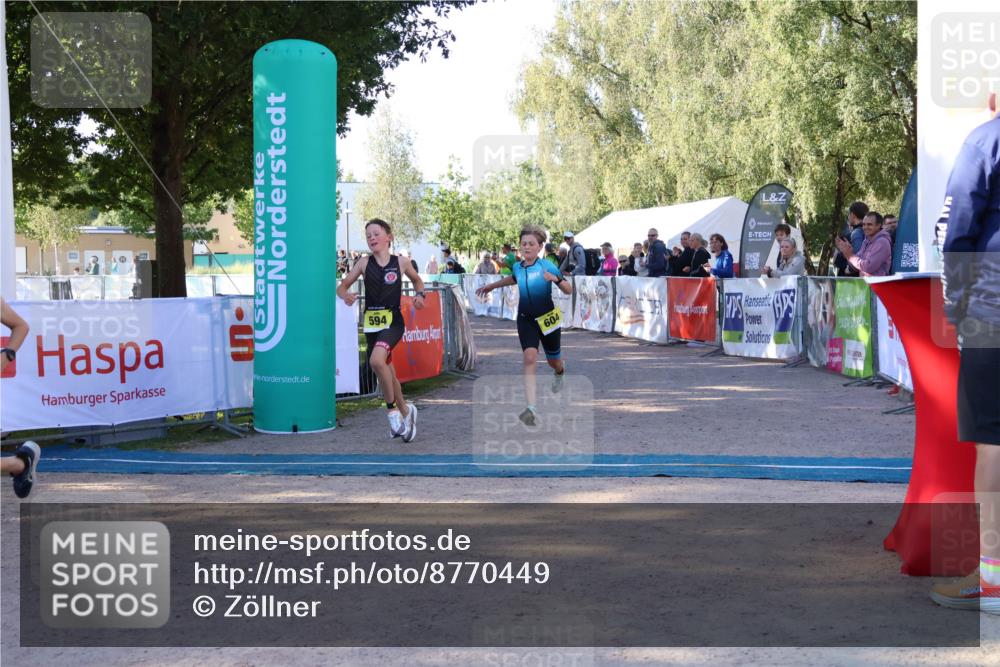 07.09.2025 - 19. Norderstedt Triathlon Zöllner http://msf.ph/oto/8770449 07.09.2025 09:45:56 Ziel 594, 595, 604 meine-sportfotos.de