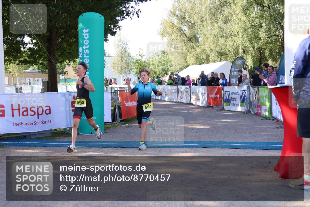 07.09.2025 - 19. Norderstedt Triathlon Zöllner http://msf.ph/oto/8770457 07.09.2025 09:45:56 Ziel 594, 595, 604 meine-sportfotos.de