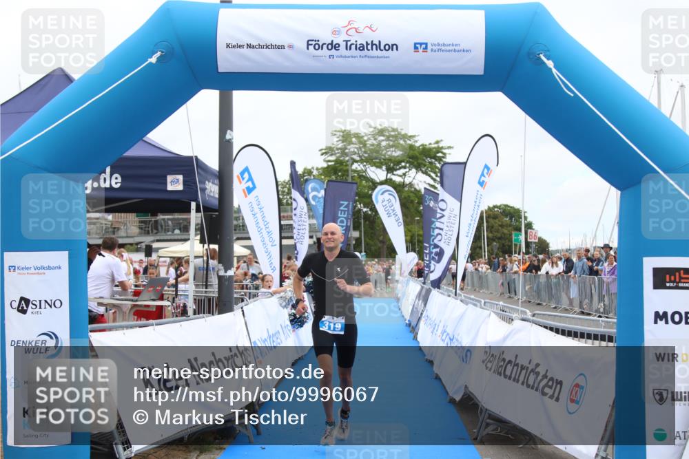 16.08.2026 - KN Förde Triathlon 2026 Markus Tischler http://msf.ph/oto/9996067 16.08.2026 11:53:38 Ziel 319, 319 meine-sportfotos.de