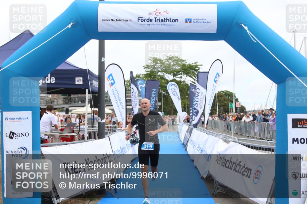 16.08.2026 - KN Förde Triathlon 2026 Markus Tischler http://msf.ph/oto/9996071 16.08.2026 11:53:38 Ziel 319, 319 meine-sportfotos.de