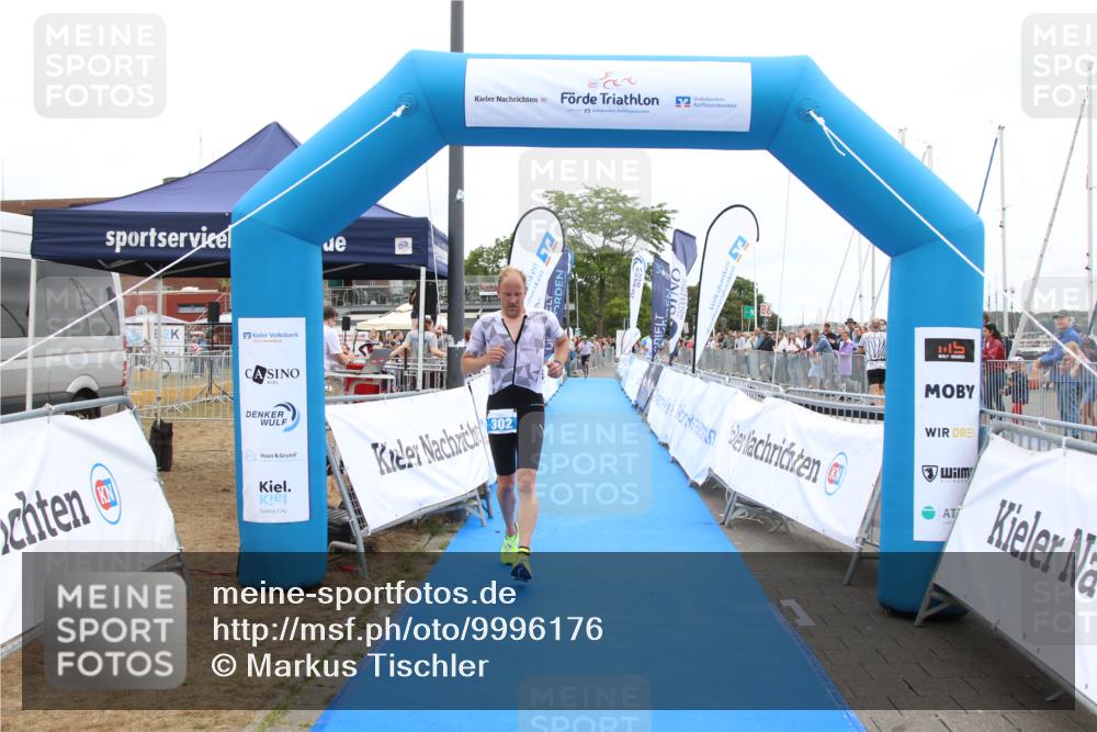 16.08.2026 - KN Förde Triathlon 2026 Markus Tischler http://msf.ph/oto/9996176 16.08.2026 11:54:58 Ziel 302, 302 meine-sportfotos.de