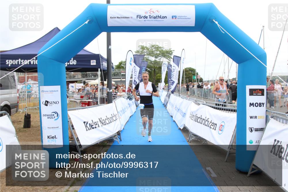 16.08.2026 - KN Förde Triathlon 2026 Markus Tischler http://msf.ph/oto/9996317 16.08.2026 11:56:49 Ziel 310, 323, 441, 310, 323, 441 meine-sportfotos.de