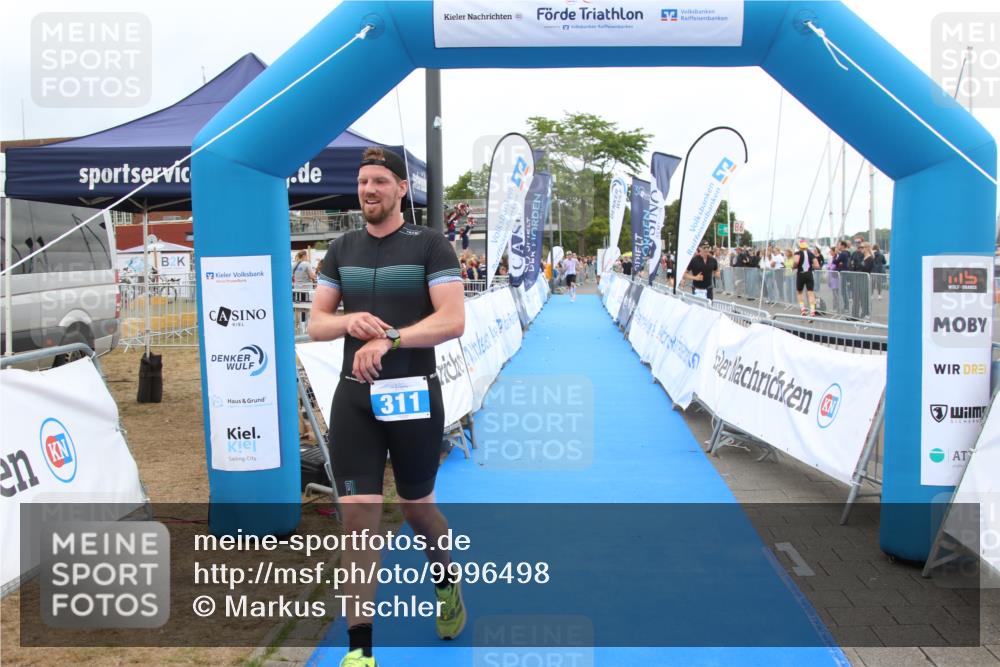16.08.2026 - KN Förde Triathlon 2026 Markus Tischler http://msf.ph/oto/9996498 16.08.2026 11:58:38 Ziel 311, 321, 311, 321 meine-sportfotos.de