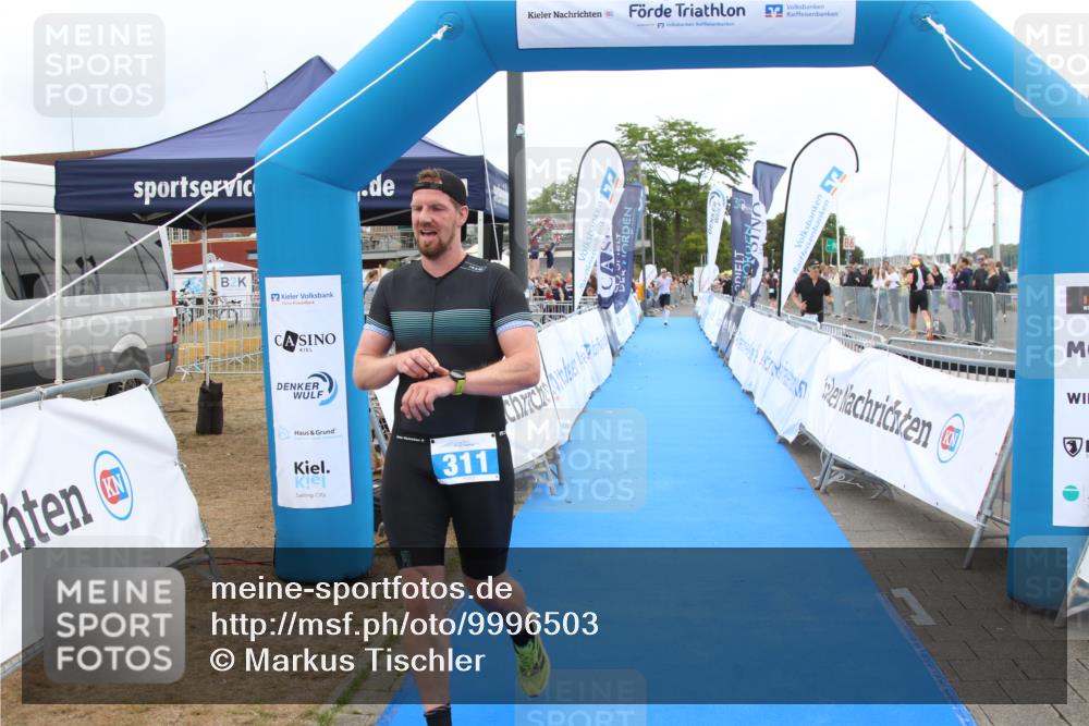 16.08.2026 - KN Förde Triathlon 2026 Markus Tischler http://msf.ph/oto/9996503 16.08.2026 11:58:38 Ziel 311, 321, 311, 321 meine-sportfotos.de