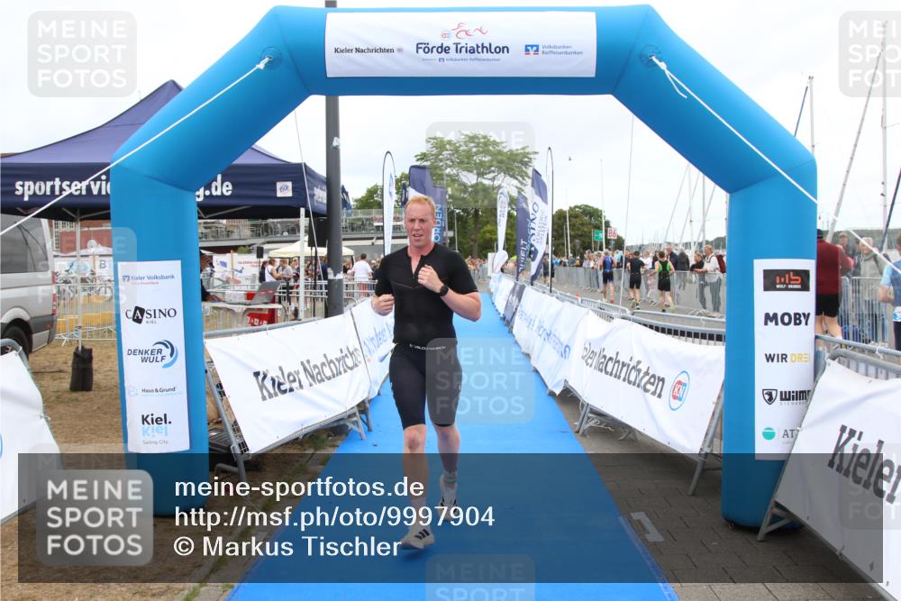 16.08.2026 - KN Förde Triathlon 2026 Markus Tischler http://msf.ph/oto/9997904 16.08.2026 12:03:43 Ziel 312, 312 meine-sportfotos.de