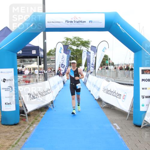 16.08.2026 - KN Förde Triathlon 2026 Markus Tischler http://msf.ph/oto/10000529 16.08.2026 12:21:29 Ziel 369, 369 meine-sportfotos.de
