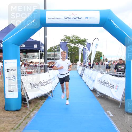 16.08.2026 - KN Förde Triathlon 2026 Markus Tischler http://msf.ph/oto/10001854 16.08.2026 13:44:11 Ziel 702, 702 meine-sportfotos.de