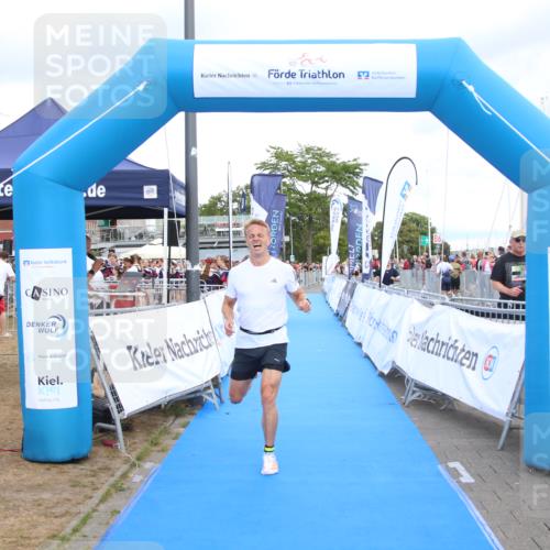 16.08.2026 - KN Förde Triathlon 2026 Markus Tischler http://msf.ph/oto/10001856 16.08.2026 13:44:11 Ziel 702, 702 meine-sportfotos.de