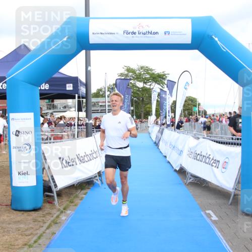 16.08.2026 - KN Förde Triathlon 2026 Markus Tischler http://msf.ph/oto/10001857 16.08.2026 13:44:11 Ziel 702, 702 meine-sportfotos.de