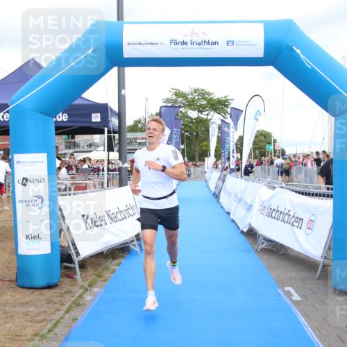 16.08.2026 - KN Förde Triathlon 2026 Markus Tischler http://msf.ph/oto/10001858 16.08.2026 13:44:11 Ziel 702, 702 meine-sportfotos.de