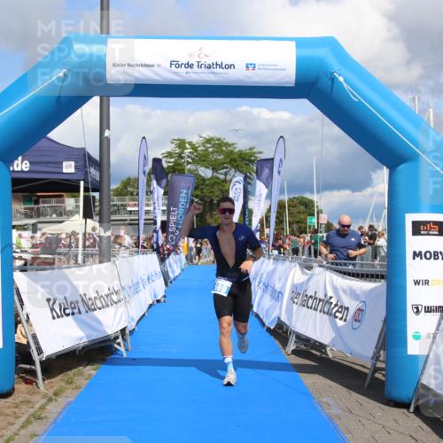 16.08.2026 - KN Förde Triathlon 2026 Markus Tischler http://msf.ph/oto/10002267 16.08.2026 13:55:00 Ziel 569, 569 meine-sportfotos.de