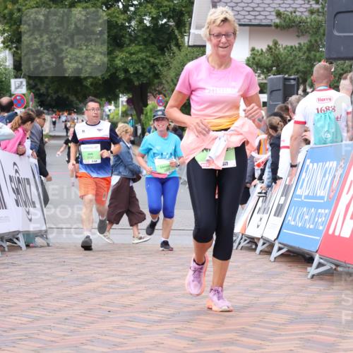 30.08.2026 - Blankeneser Heldenlauf Lena Gebhardt http://msf.ph/oto/10077264 30.08.2026 10:39:37 Ziel 5782, 5829, 5830 meine-sportfotos.de
