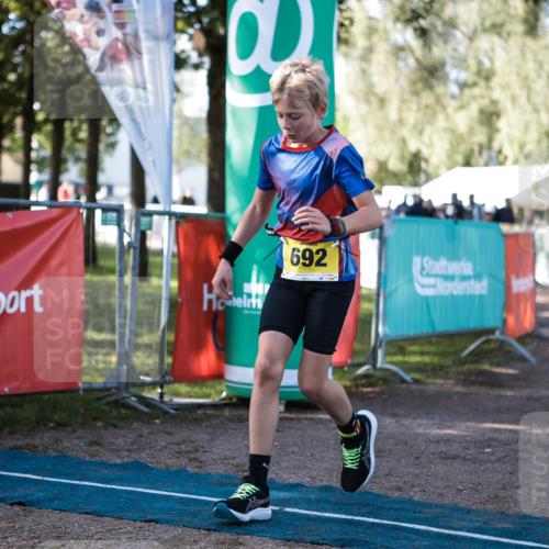 06.09.2026 - 20. Norderstedt Triathlon H.Heesch http://msf.ph/oto/10199443 06.09.2026 09:48:48 Ziel 669, 692 meine-sportfotos.de