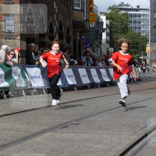 13.09.2026 - 21. swb-Marathon Bremen Strokosch-Dieckow http://msf.ph/oto/10296520 13.09.2026 11:29:46 Ziel 10387 meine-sportfotos.de