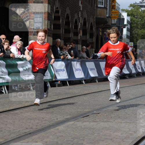 13.09.2026 - 21. swb-Marathon Bremen Strokosch-Dieckow http://msf.ph/oto/10296578 13.09.2026 11:29:46 Ziel 10387 meine-sportfotos.de